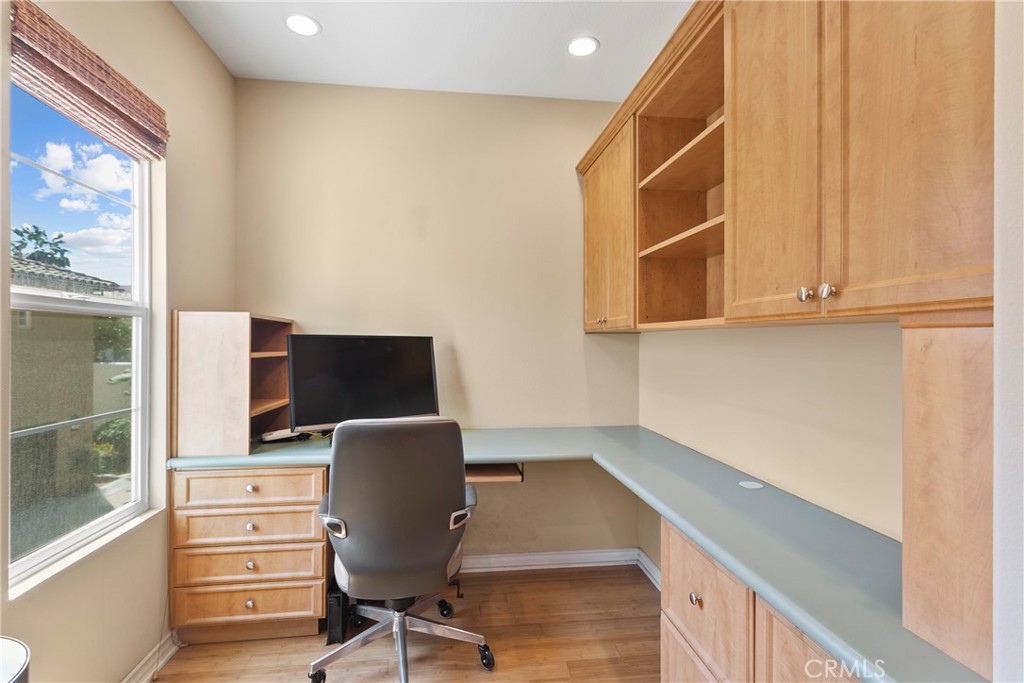 21331 Veleta Circle Huntington Beach, CA 92648 - Photo 7 of 14 a view of workspace with wooden floor windows