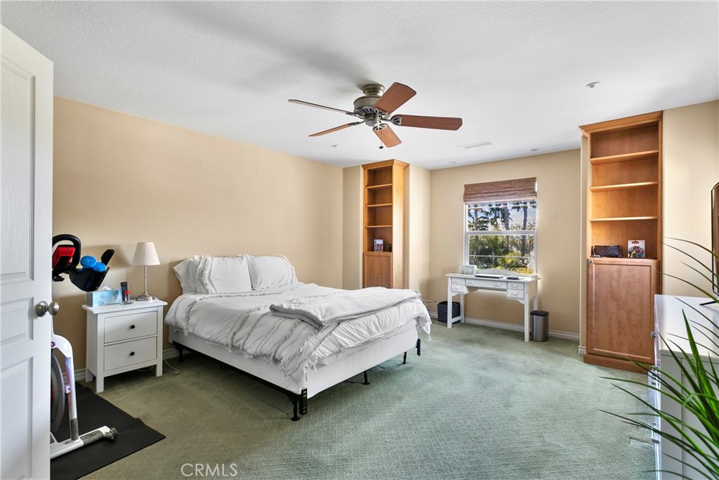 21331 Veleta Circle Huntington Beach, CA 92648 - Photo 8 of 14 a bedroom with a bed and a window