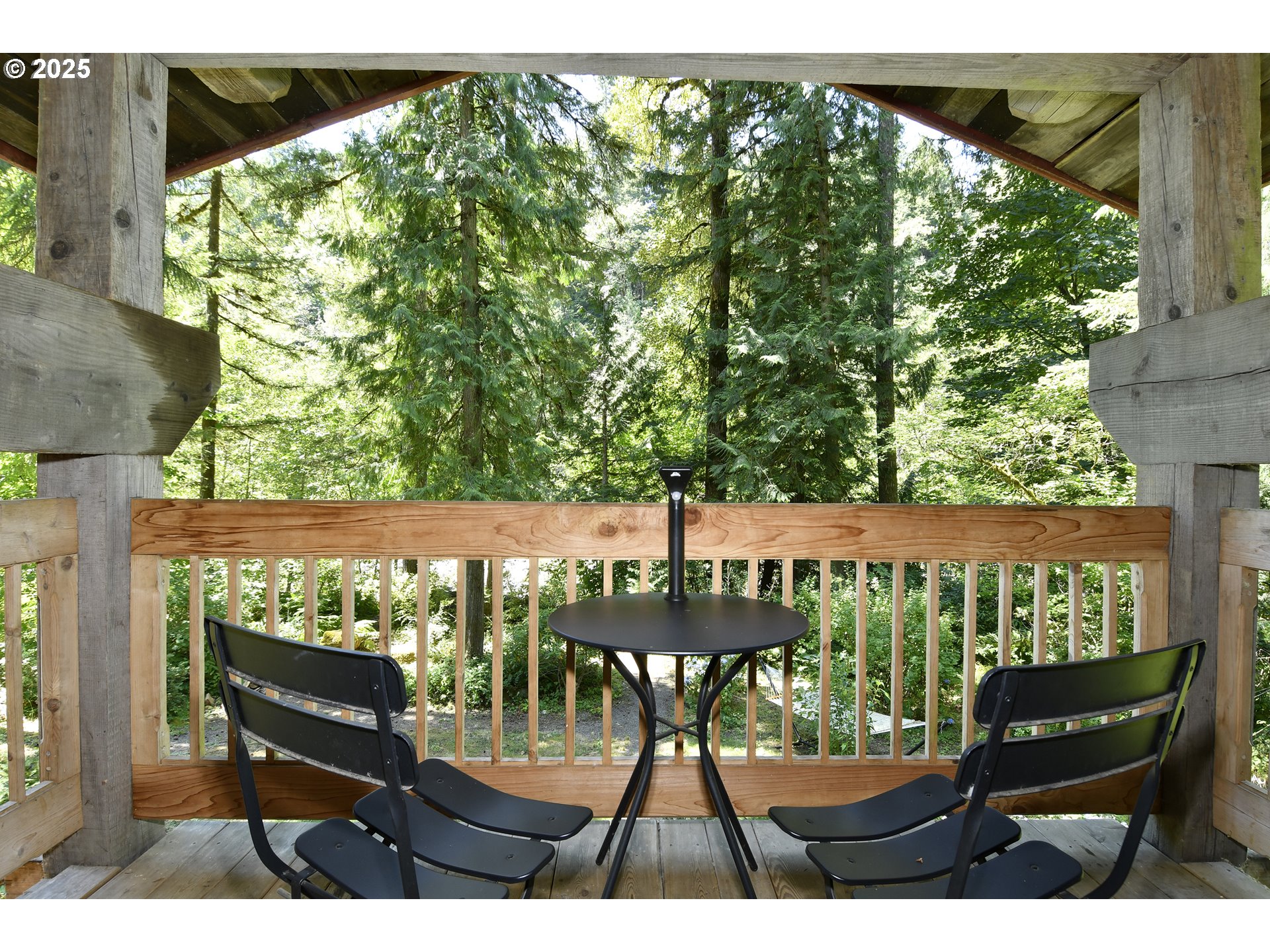 64135 East Relton Road Rhododendron, OR 97049 - Photo 30 of 48 a view of a chairs and table in patio