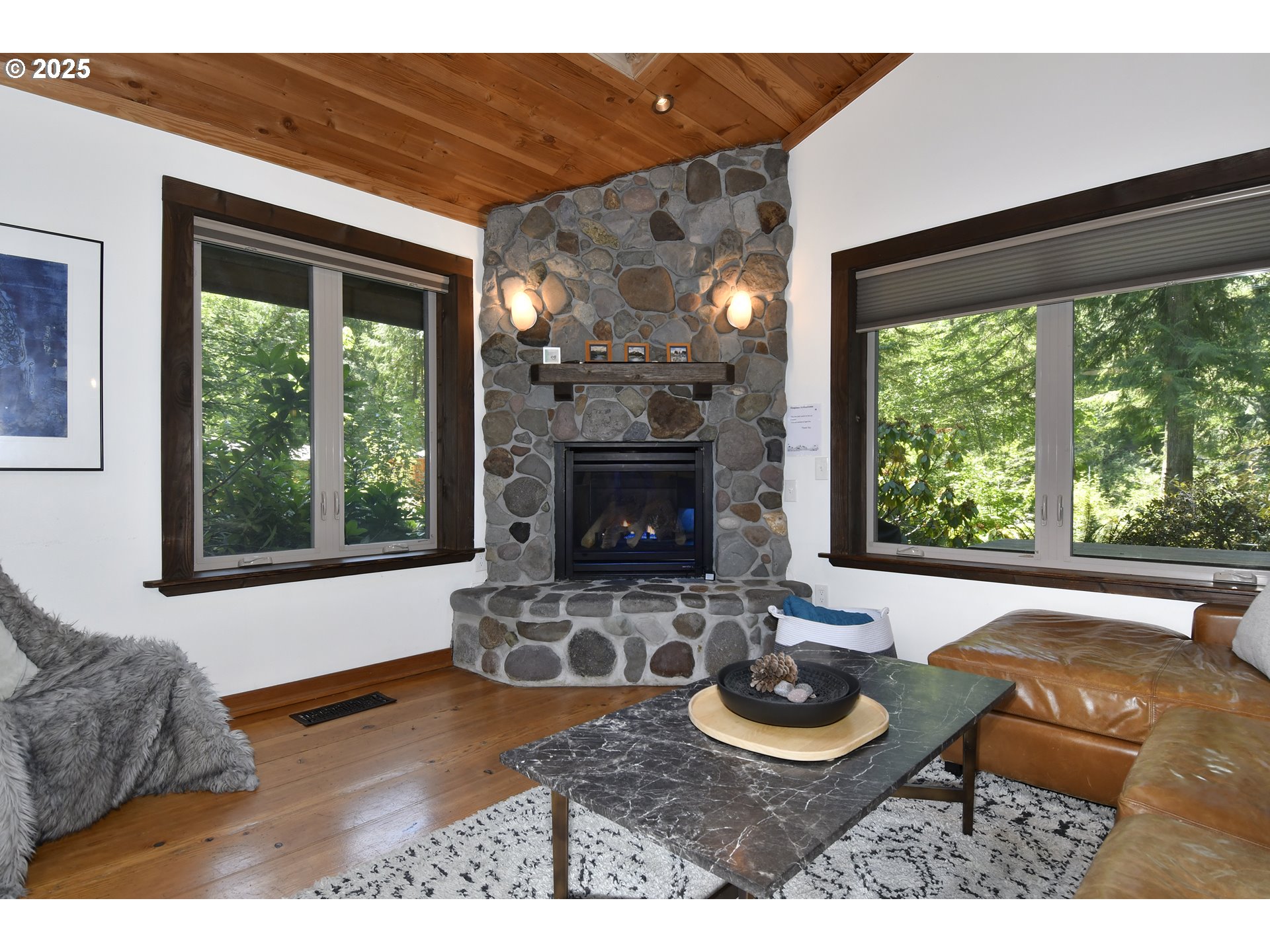 64135 East Relton Road Rhododendron, OR 97049 - Photo 5 of 48 a living room with furniture and a fireplace