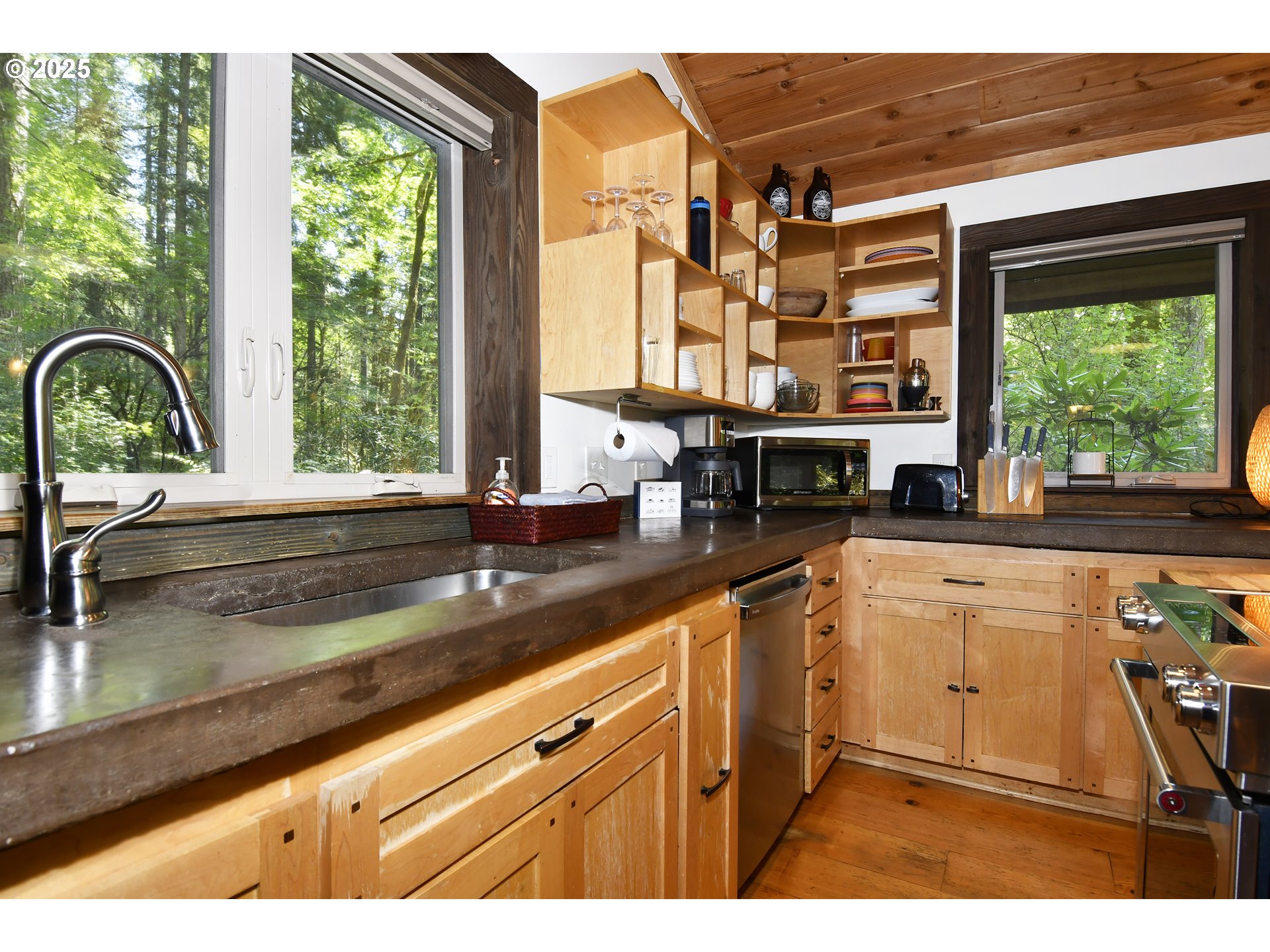 64135 East Relton Road Rhododendron, OR 97049 - Photo 10 of 48 a kitchen with a window a sink and a counter space