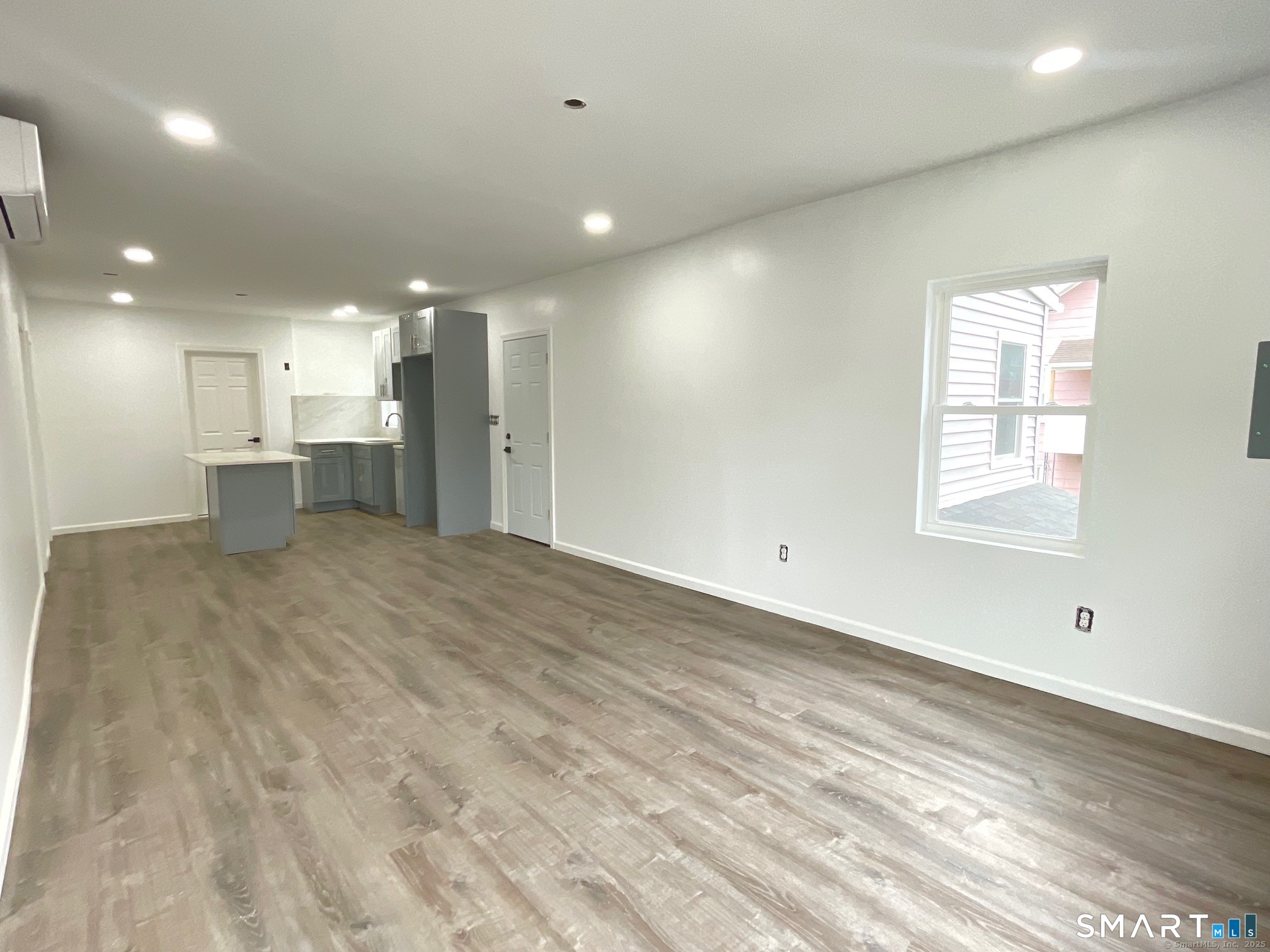 32 Lester Street, Unit 2 Ansonia, CT 06401 - Photo 8 of 9 a view of a kitchen with a sink and a window