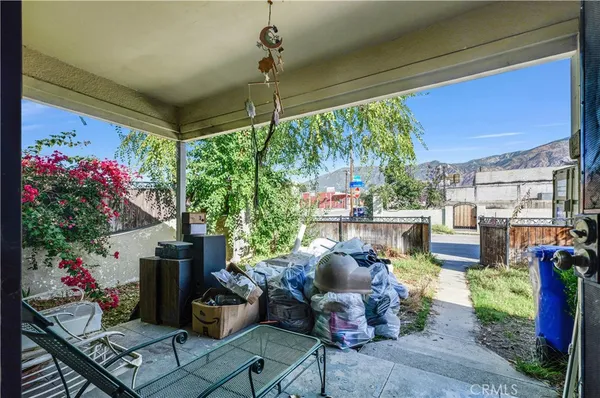 a outdoor living space with furniture and garden view