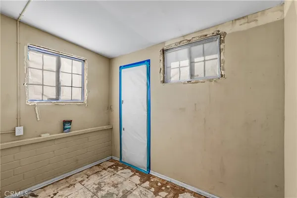 a room that has a window and storage