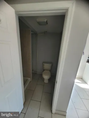 a bathroom with a sink and toilet