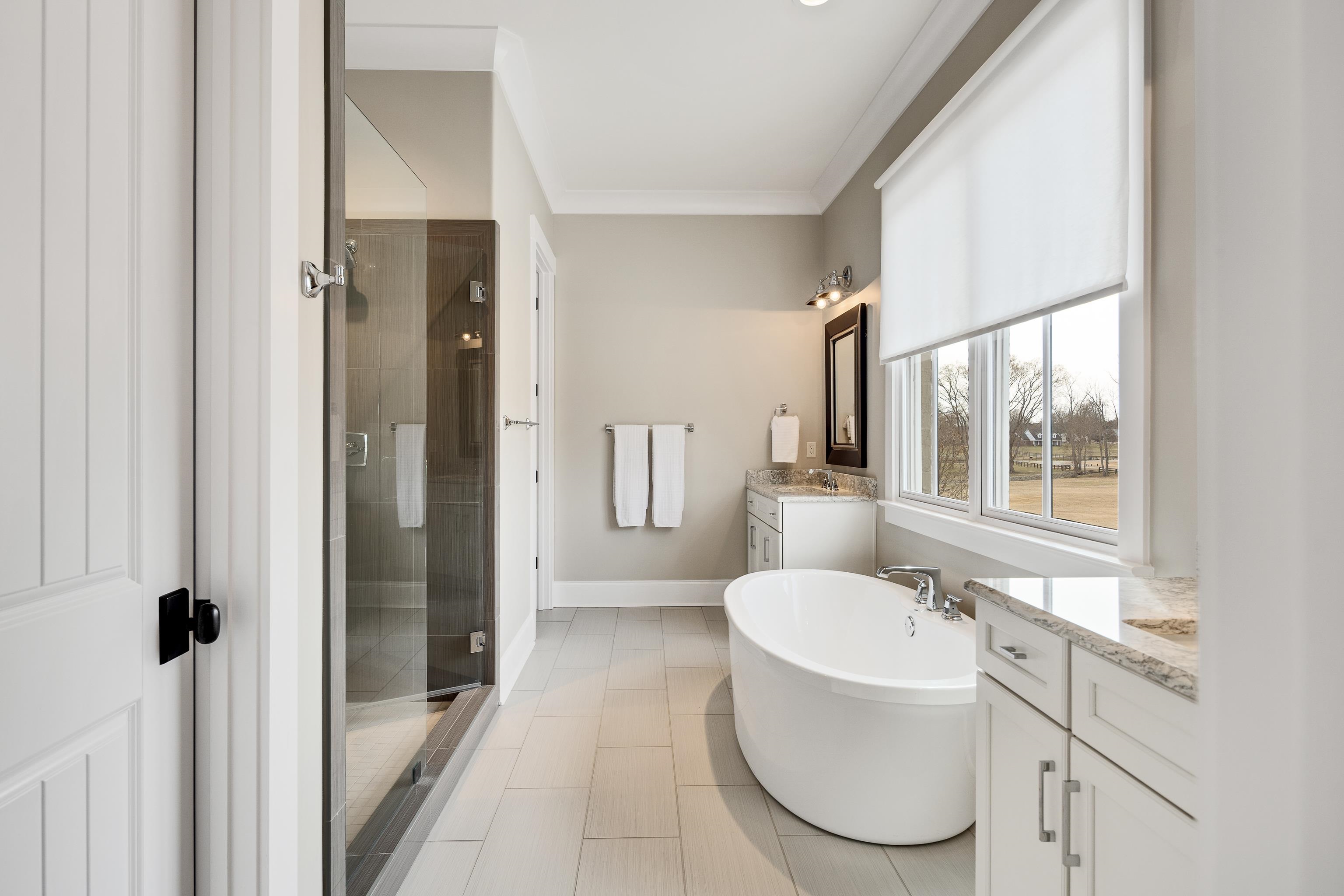 770 Ballard Road Piperton, TN 38017 - Photo 28 of 40 a bathroom with a sink toilet and shower