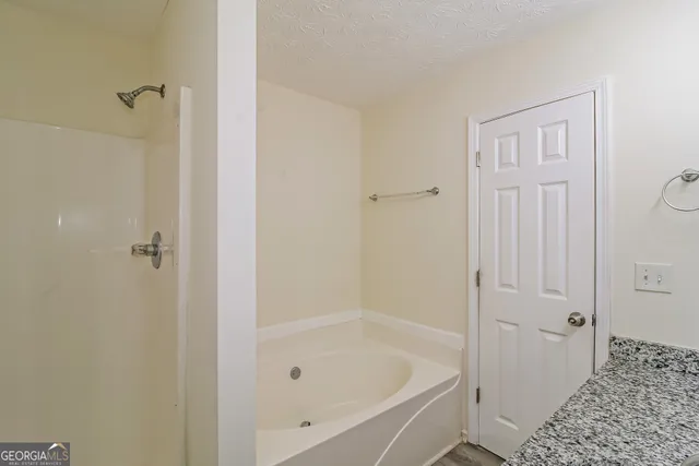 a bathroom with a bathtub