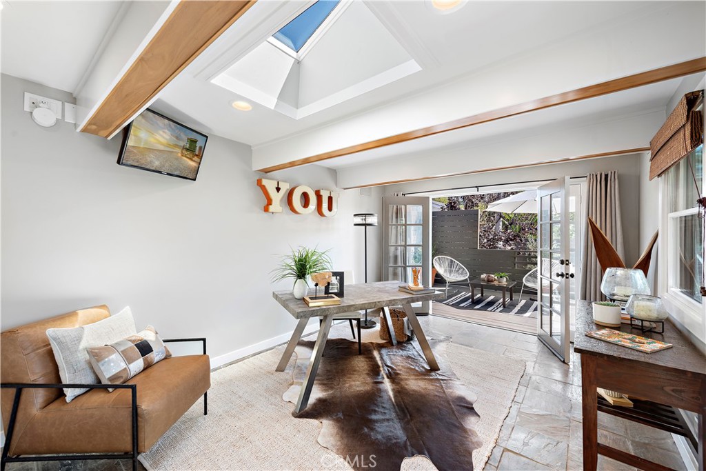 461 Shadow Lane Laguna Beach, CA 92651 - Photo 21 of 54 a living room with furniture and a large window