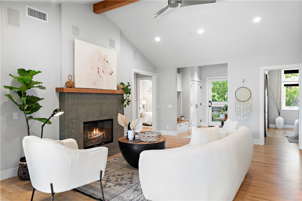 461 Shadow Lane Laguna Beach, CA 92651 - Photo 30 of 54 a living room with furniture and a fireplace