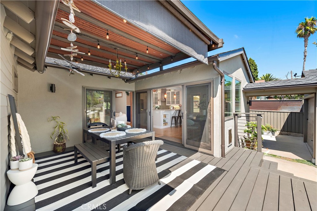 461 Shadow Lane Laguna Beach, CA 92651 - Photo 35 of 54 a dining room with furniture and wooden floor