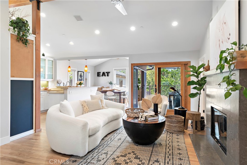 461 Shadow Lane Laguna Beach, CA 92651 - Photo 4 of 54 a living room with fireplace furniture and a potted plant