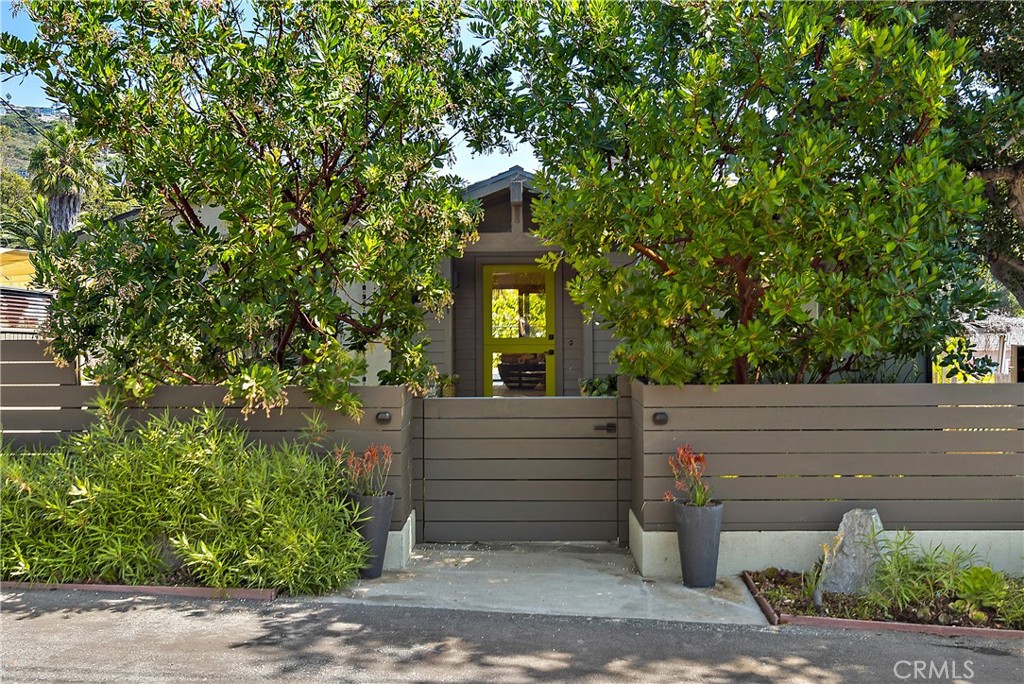 461 Shadow Lane Laguna Beach, CA 92651 - Photo 41 of 54 a view of a brick house with a large windows