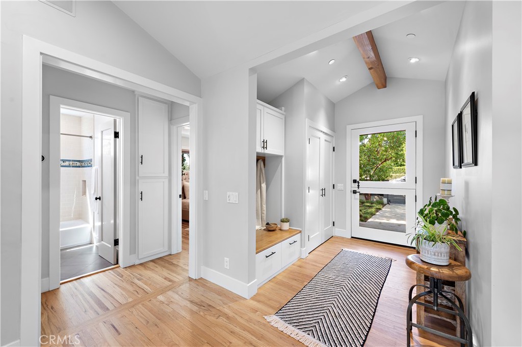 461 Shadow Lane Laguna Beach, CA 92651 - Photo 5 of 54 a spacious bedroom with a bed and a potted plant