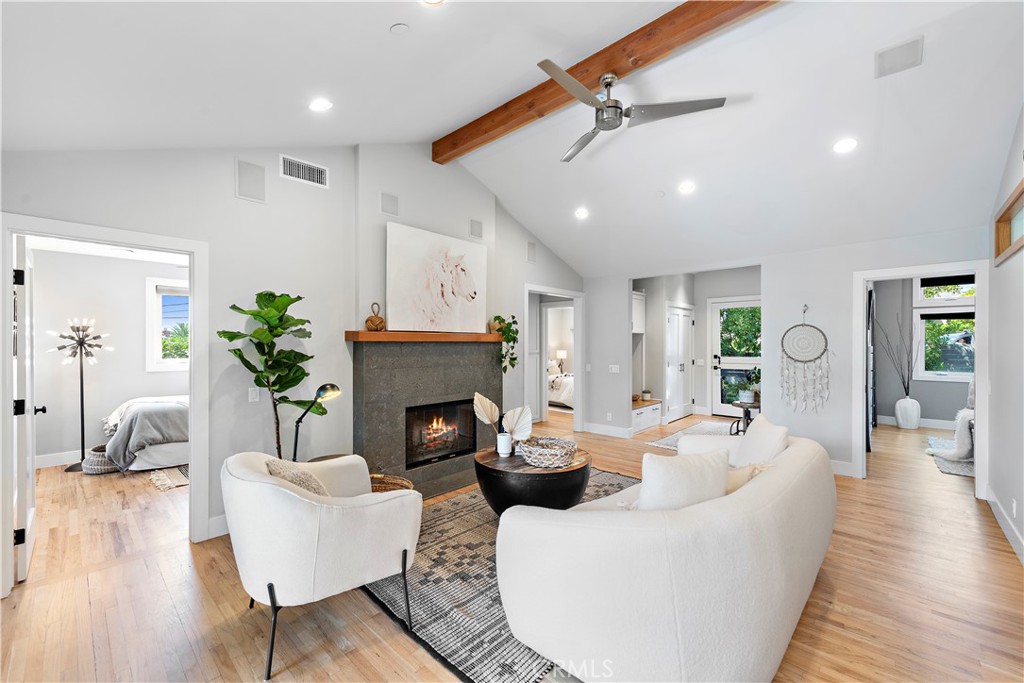 461 Shadow Lane Laguna Beach, CA 92651 - Photo 6 of 54 a living room with furniture and a fireplace