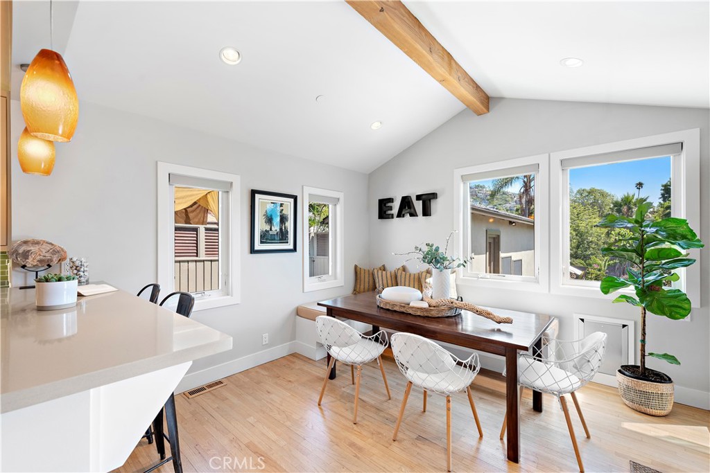 461 Shadow Lane Laguna Beach, CA 92651 - Photo 7 of 54 a view of a dining room with furniture and wooden floor