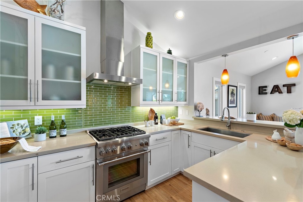 461 Shadow Lane Laguna Beach, CA 92651 - Photo 10 of 54 a kitchen that has a sink and a stove