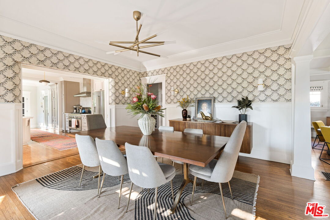 375 North Ridgewood Place Los Angeles, CA 90004 - Photo 14 of 56 a view of a dining room with furniture and wooden floor