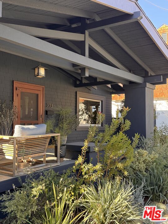 375 North Ridgewood Place Los Angeles, CA 90004 - Photo 2 of 56 a view of swimming pool with outdoor seating