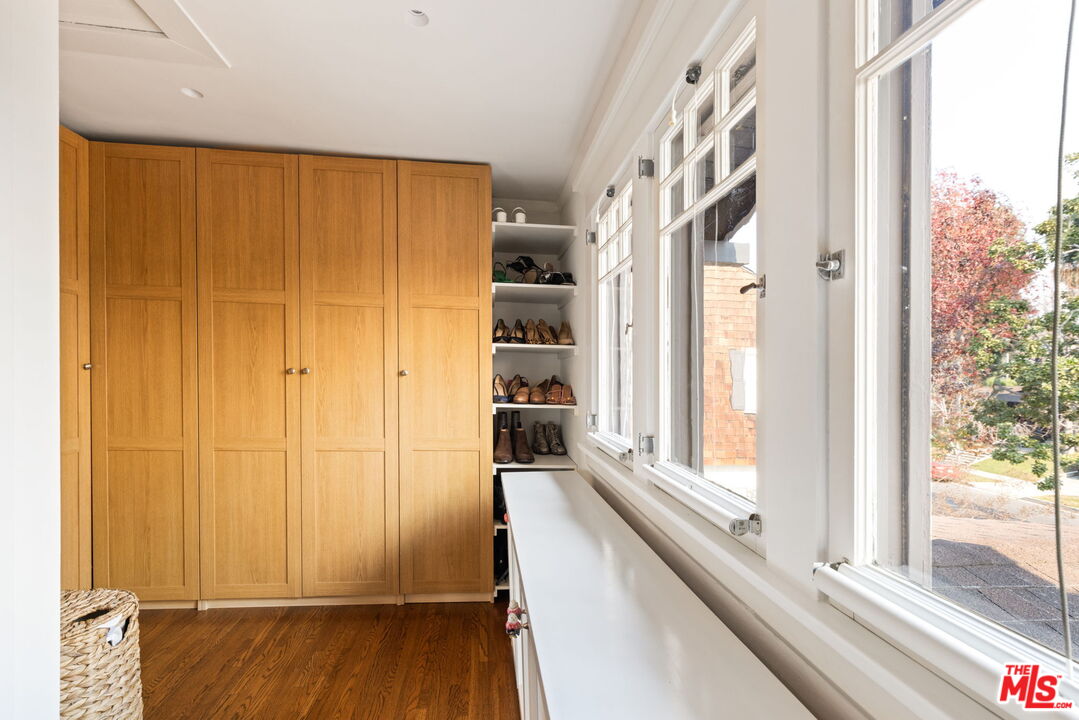 375 North Ridgewood Place Los Angeles, CA 90004 - Photo 29 of 56 a view of a balcony with wooden floor and windows
