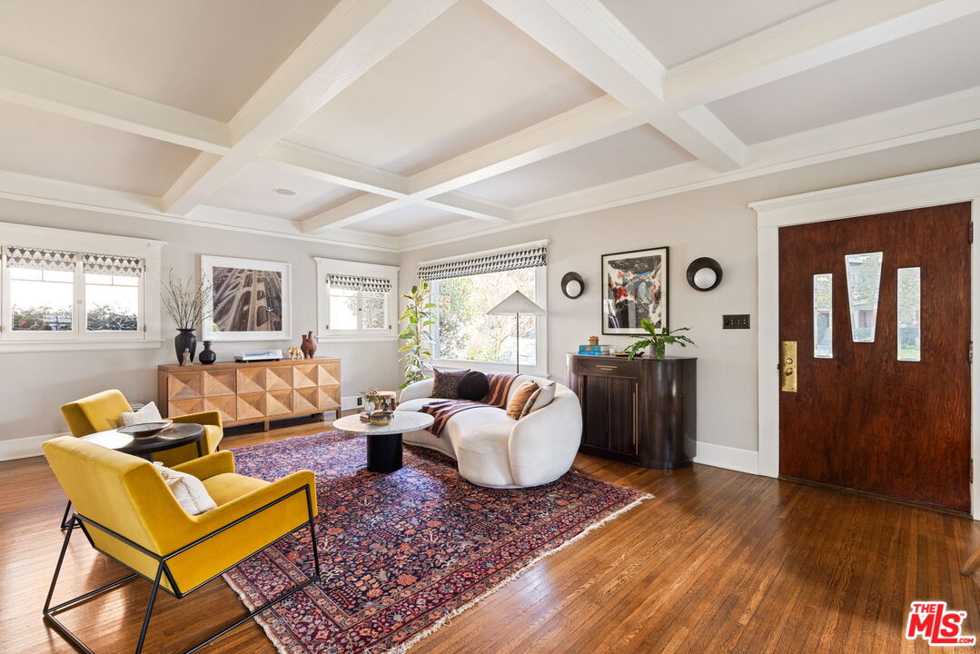 375 North Ridgewood Place Los Angeles, CA 90004 - Photo 4 of 56 a living room with furniture and wooden floor