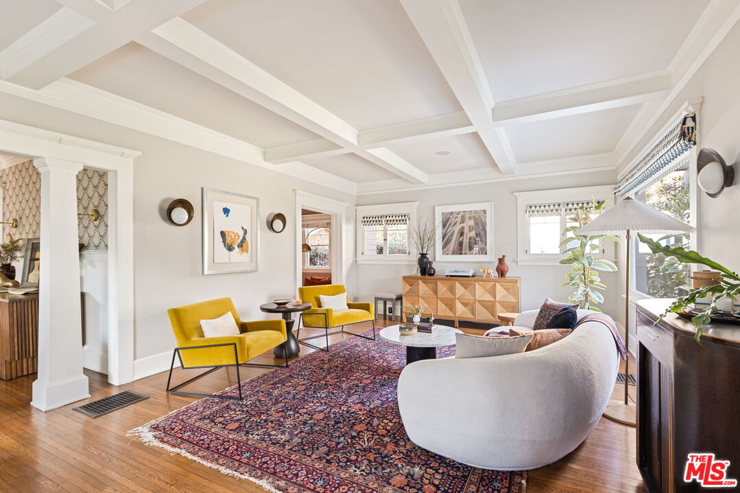 375 North Ridgewood Place Los Angeles, CA 90004 - Photo 6 of 56 a living room with furniture and wooden floor