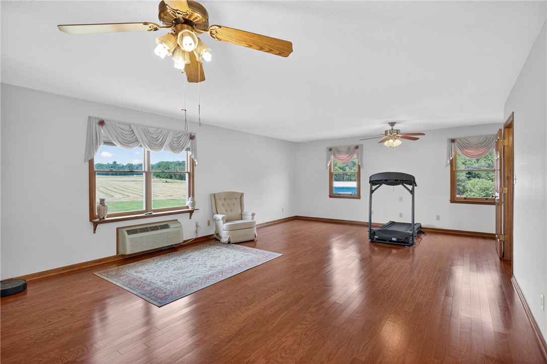 145 State Rd S-4-935 Pendleton, SC 29670 - Photo 20 of 47 Naturally illuminated interiors and durable hardwood flooring enhance this versatile room.