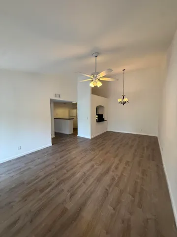 a view of a kitchen with a sink and a window