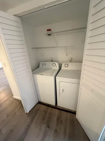 a utility room with dryer and washer