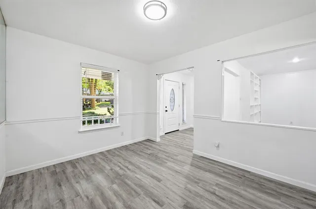 an empty room with windows