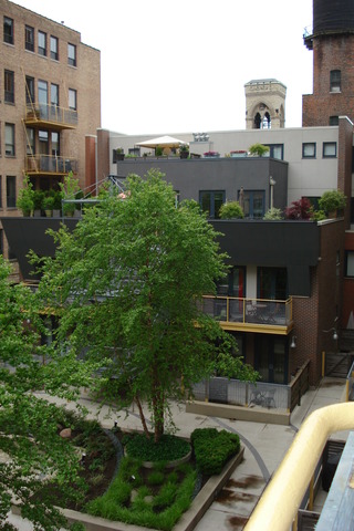 1910 South Indiana Avenue, Unit 321 Chicago, IL 60616 - Photo 23 of 25 a aerial view of a house with a yard
