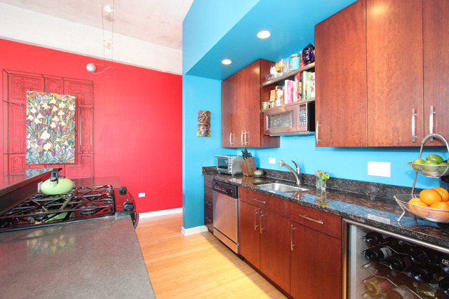 1910 South Indiana Avenue, Unit 321 Chicago, IL 60616 - Photo 4 of 25 a kitchen with stainless steel appliances a sink stove and cabinets