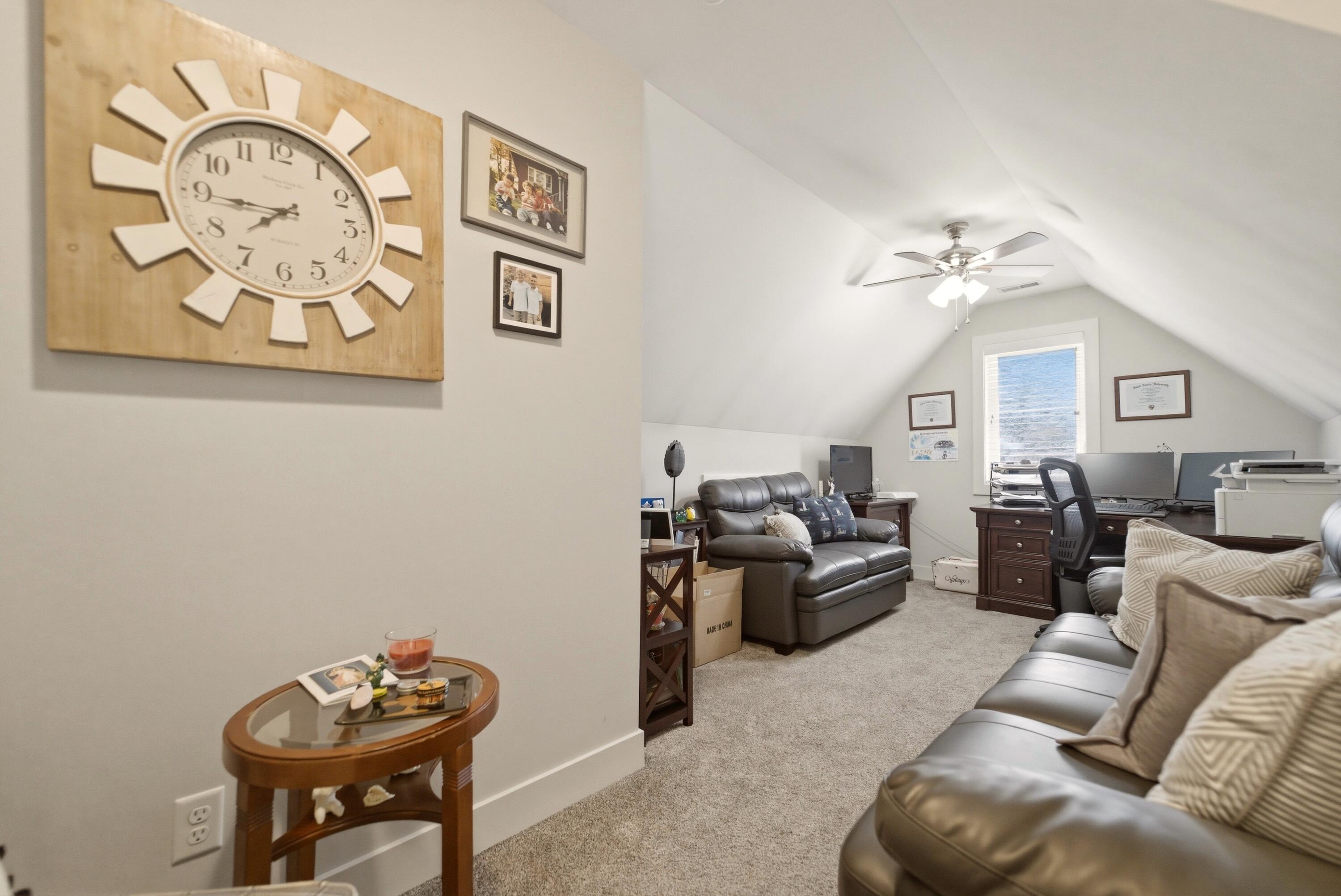 2102 Pradera Trail Chesterton, IN 46304 - Photo 36 of 50 a living room with furniture a couch and a chandelier