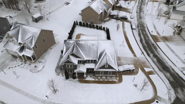 a bathroom with a granite countertop sink a toilet and a mirror