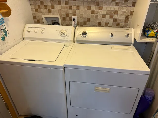 a close up view of washer and dryer