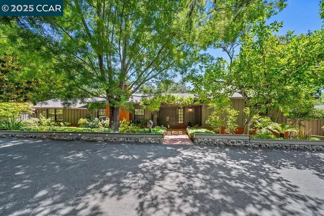 a view of a street with some trees