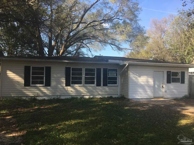 front view of house with a yard
