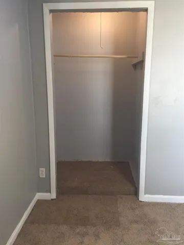 an empty room with a door