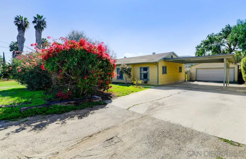 8941 Switzer Drive Spring Valley, CA 91977 - Photo 13 of 23 a front view of house with yard and green space
