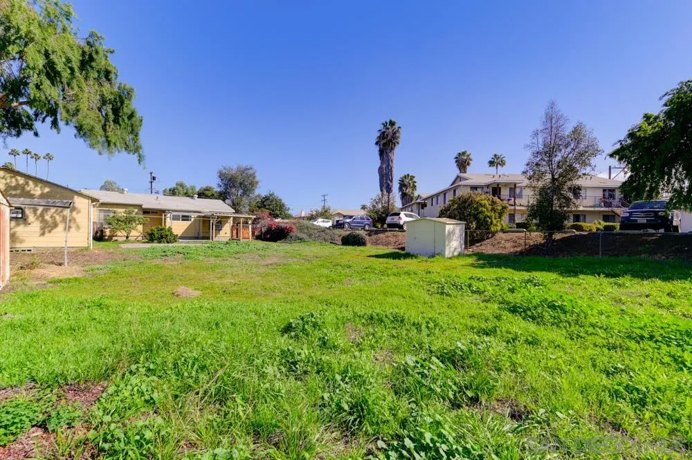 8941 Switzer Drive Spring Valley, CA 91977 - Photo 17 of 23 a front view of a house with garden