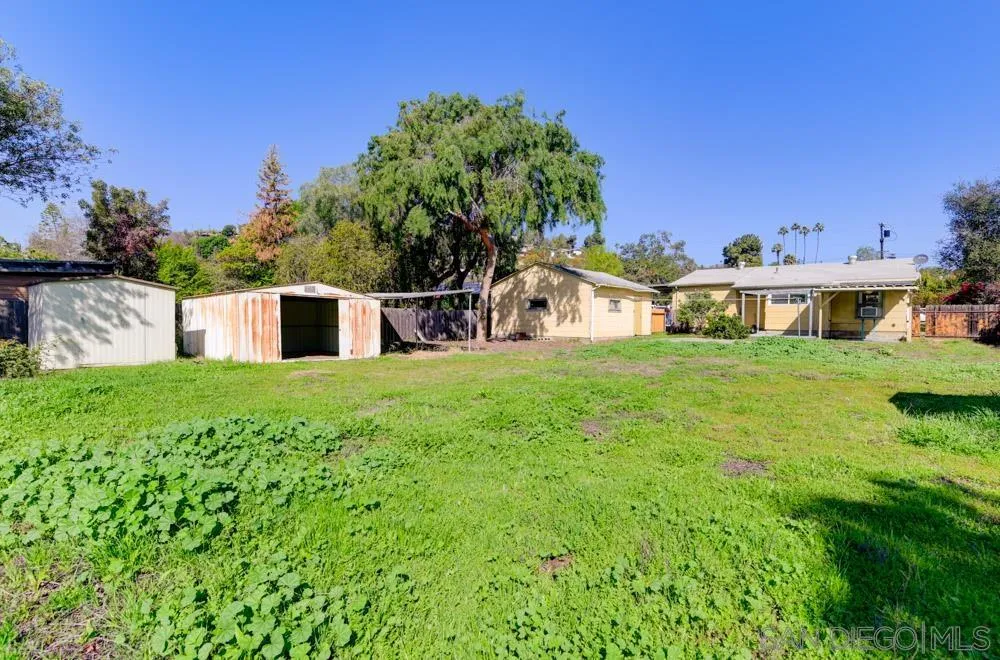 8941 Switzer Drive Spring Valley, CA 91977 - Photo 19 of 23 a view of a house with a yard