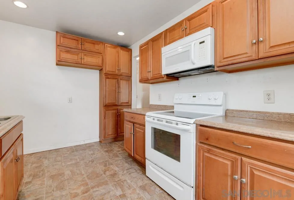 8941 Switzer Drive Spring Valley, CA 91977 - Photo 2 of 23 a view of a kitchen with electric appliances