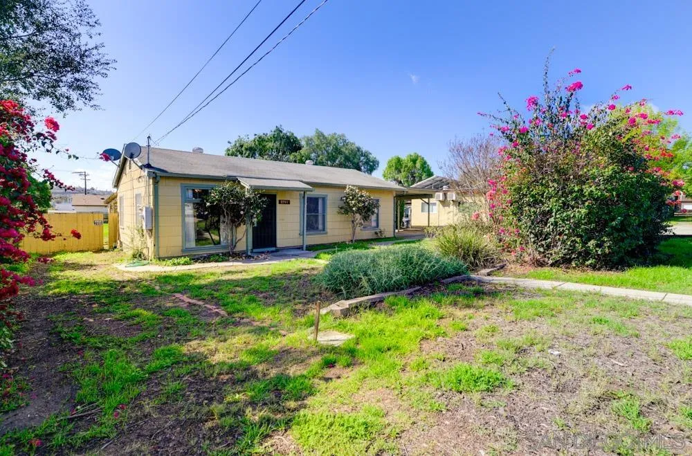 8941 Switzer Drive Spring Valley, CA 91977 - Photo 22 of 23 a view of a house with backyard and garden