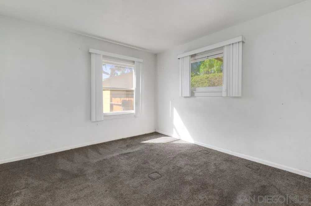 8941 Switzer Drive Spring Valley, CA 91977 - Photo 8 of 23 an empty room with windows