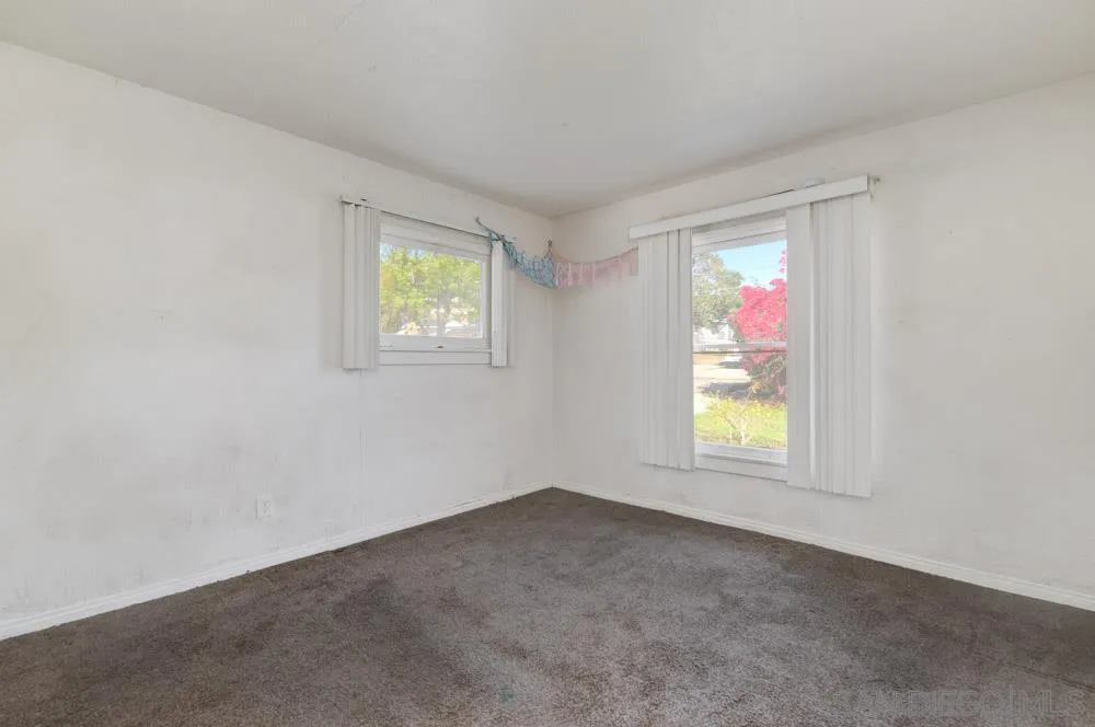 8941 Switzer Drive Spring Valley, CA 91977 - Photo 9 of 23 an empty room with a window