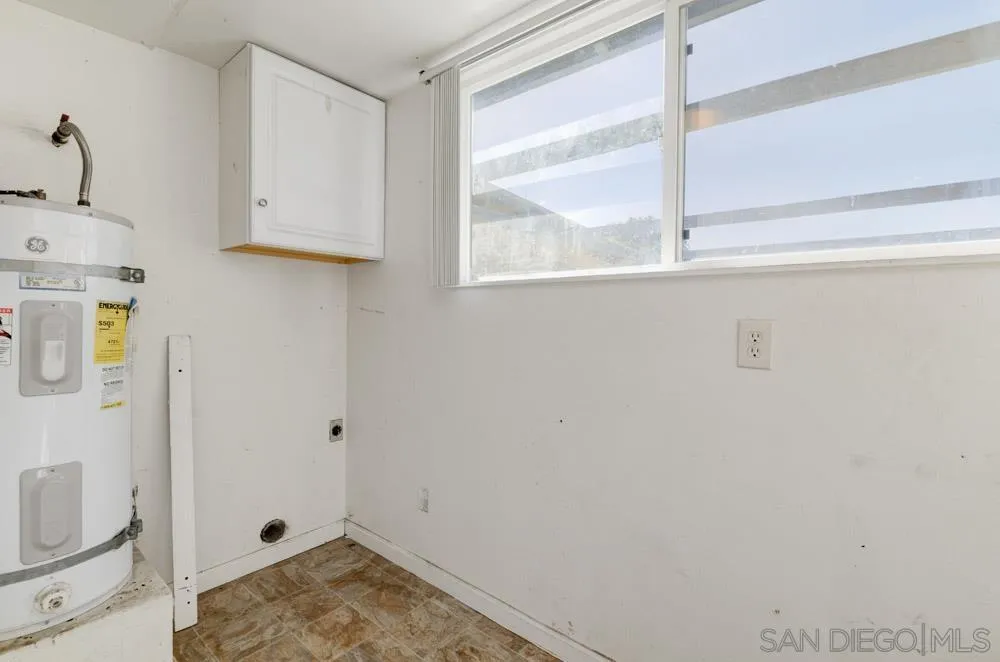 8941 Switzer Drive Spring Valley, CA 91977 - Photo 10 of 23 a view of storage and utility room with a window