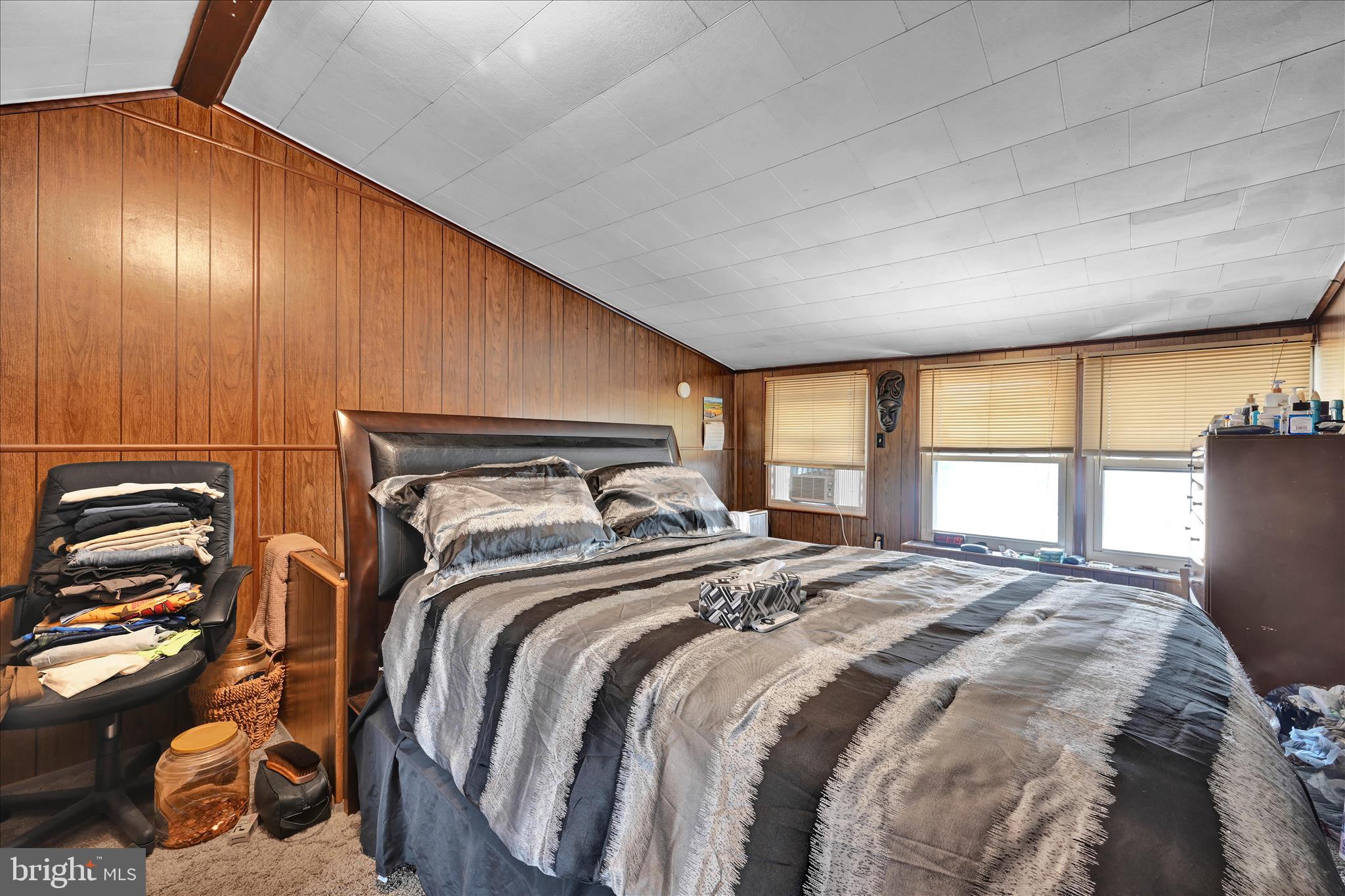 936 Pike Street Reading, PA 19604 - Photo 20 of 24 a bedroom with a bed and a large window