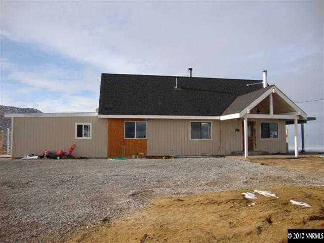 a front view of house with yard