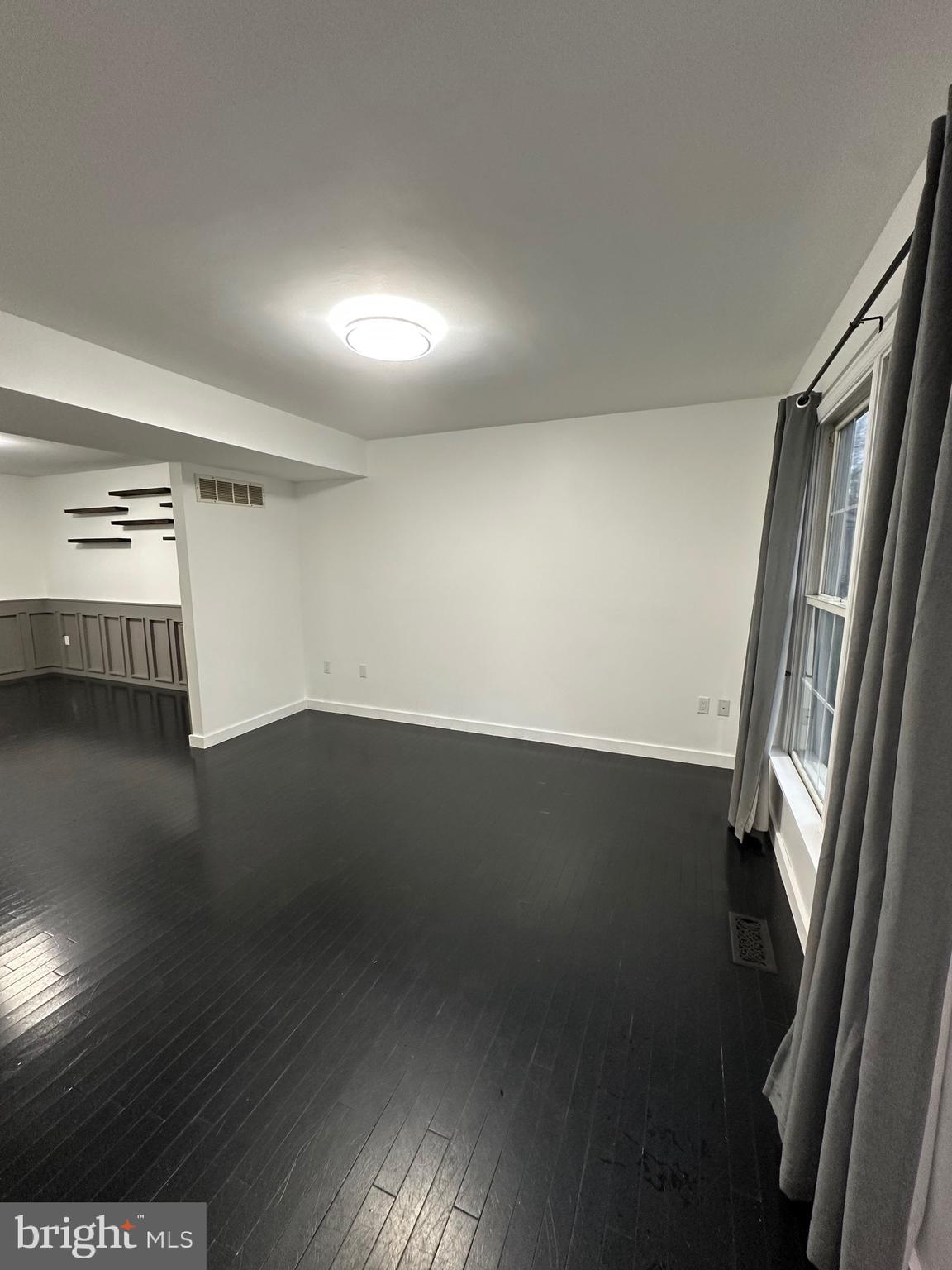 932 12th Street Pasadena, MD 21122 - Photo 7 of 14 wooden floor in an empty room