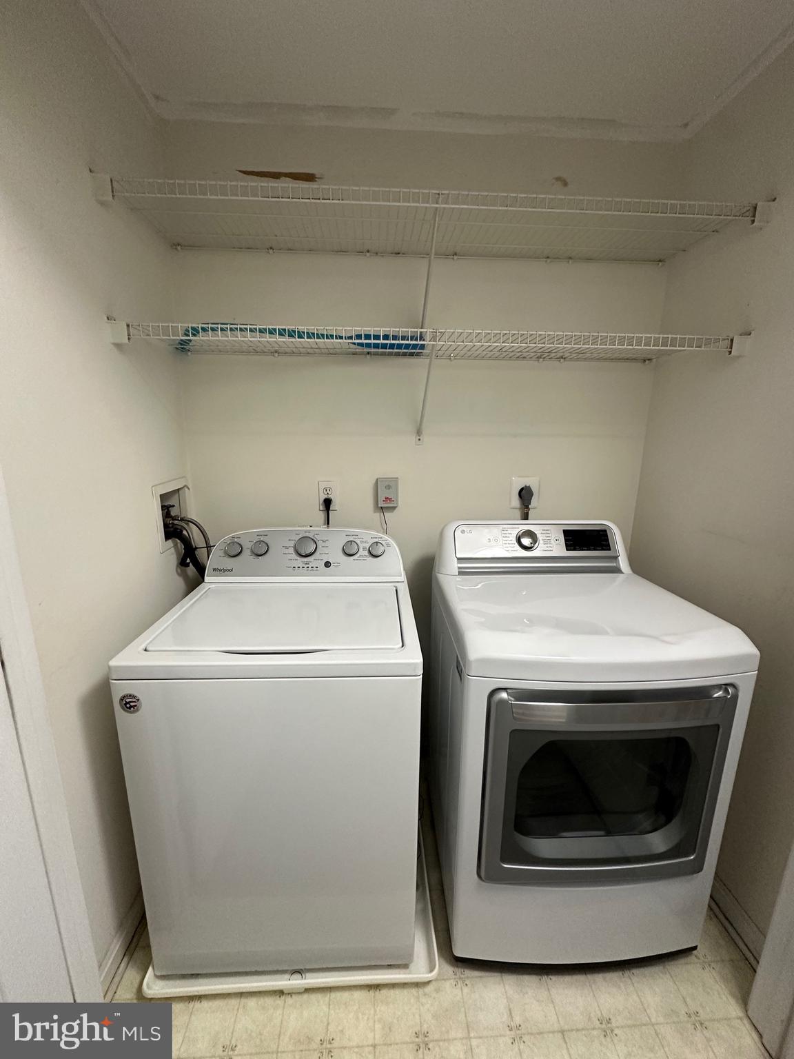 932 12th Street Pasadena, MD 21122 - Photo 10 of 14 a utility room with dryer and washer