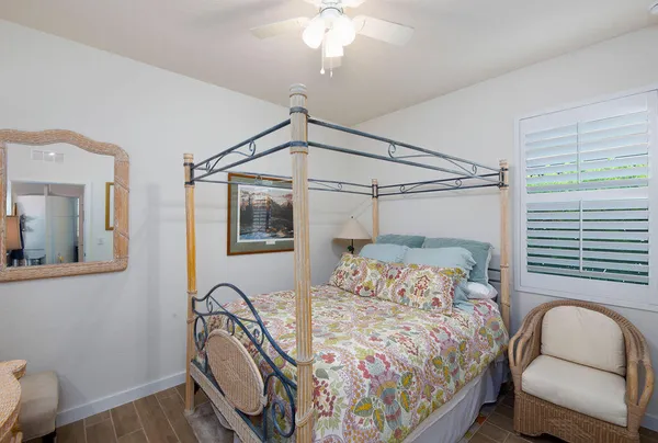 an aerial view of multiple houses with yard